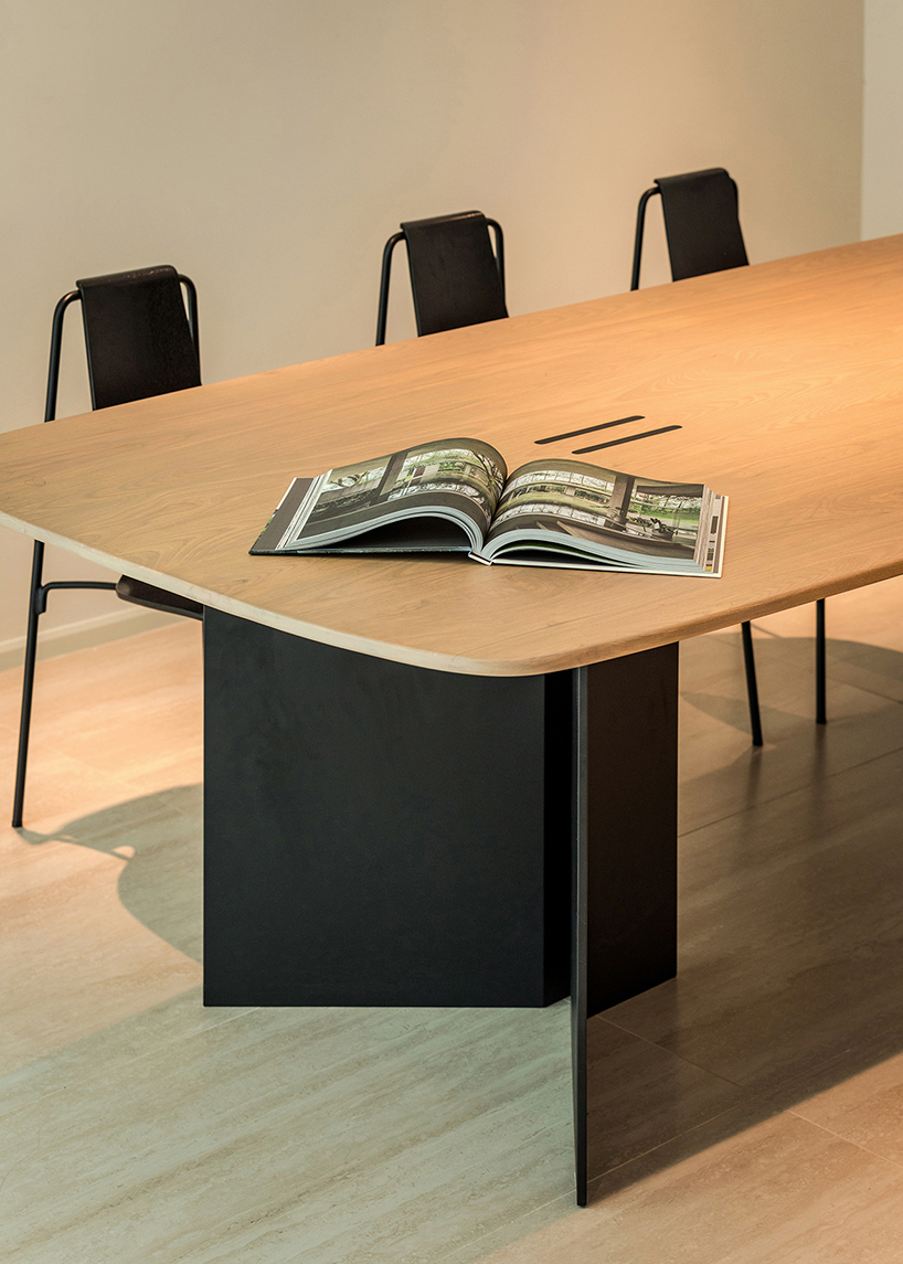 porous white brickwork facade enfolds renovated 1980s terrace house in kuala lumpur