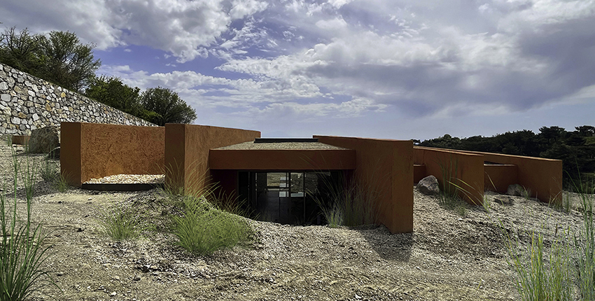 red earthen-plaster office's linear volumes trace grapevine rows in rural turkey