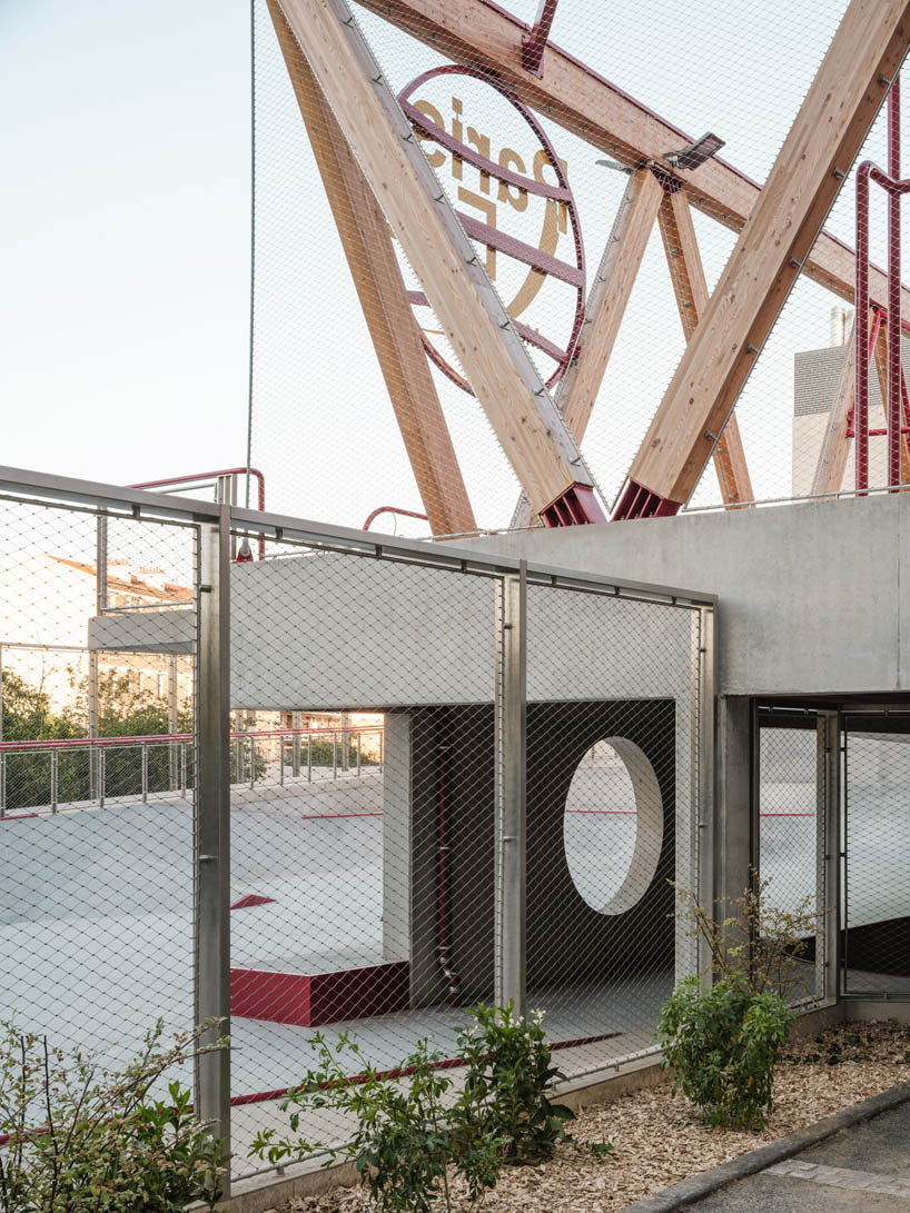 cantilever sports court crowns urban skatepark bowl along railway in france