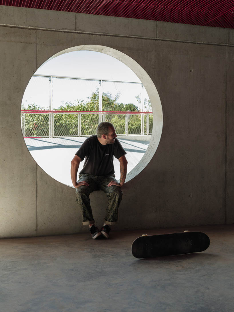 cantilever sports court crowns urban skatepark bowl along railway in france