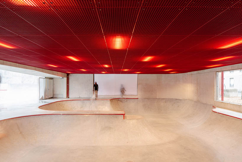 cantilever sports court crowns urban skatepark bowl along railway in france