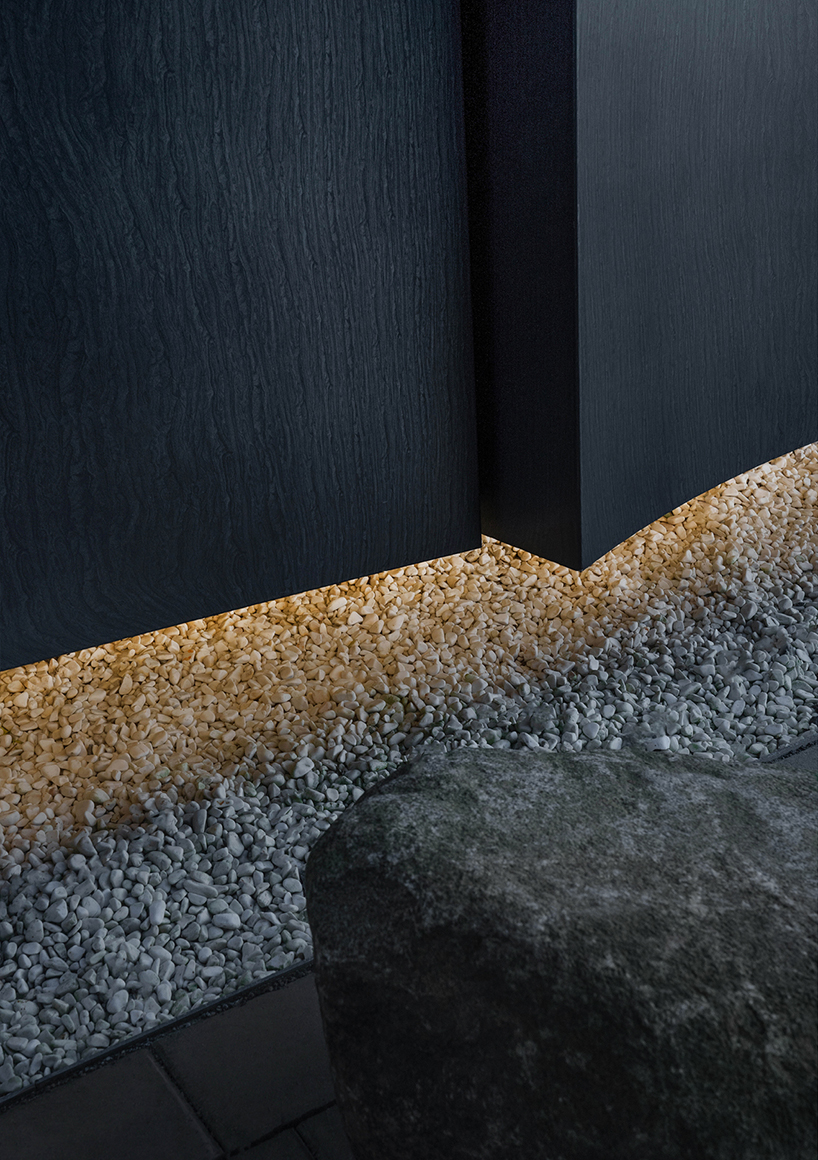 erdegard arkitekter carves 'mountain chamber' threshold to rock cavern in sweden