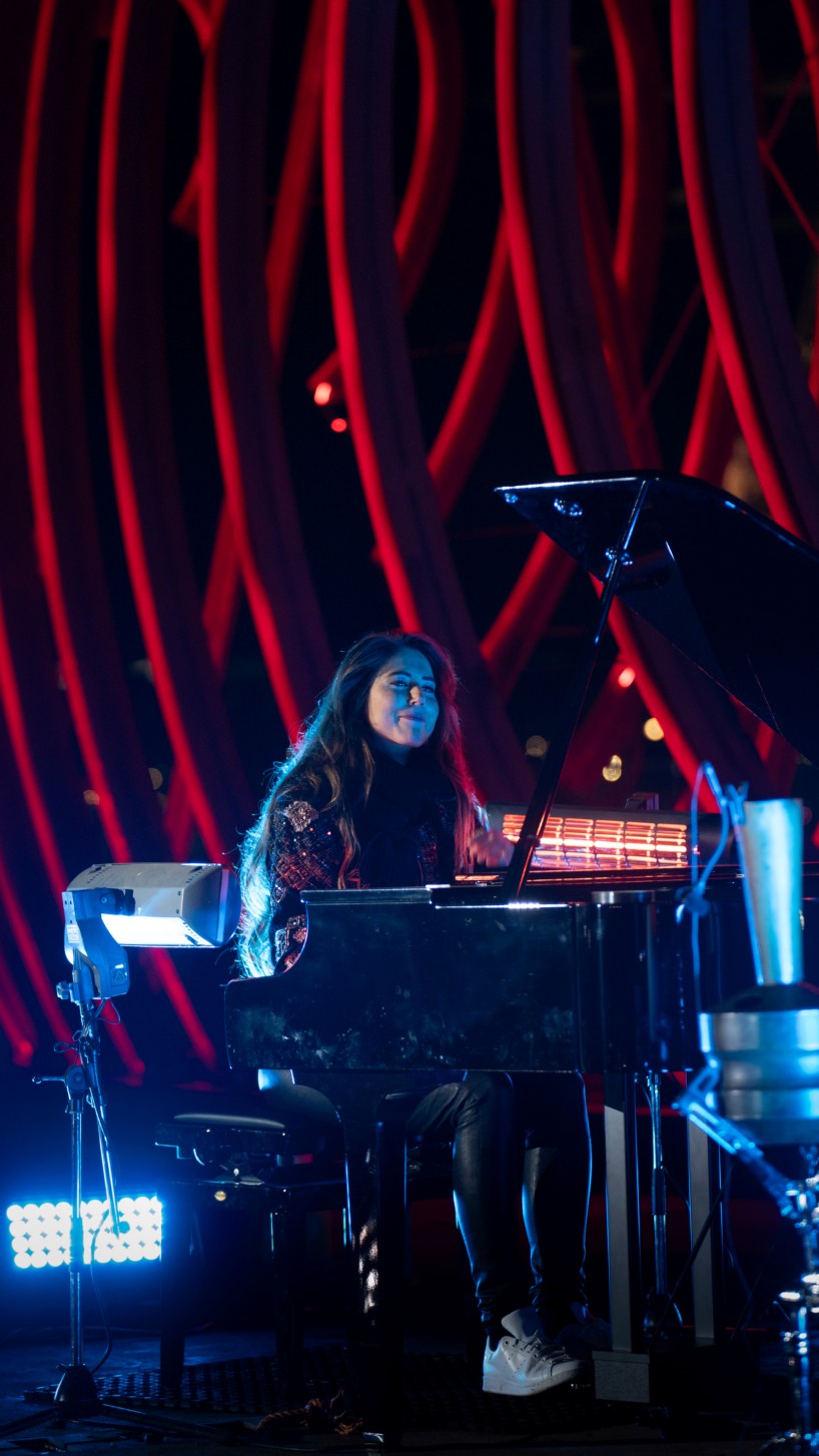 whale skeletal light installation glows red for amsterdam light festival