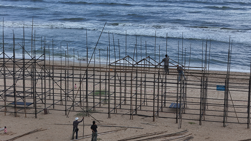 traditional bamboo scaffolding constructs temporary theater along chinese coast