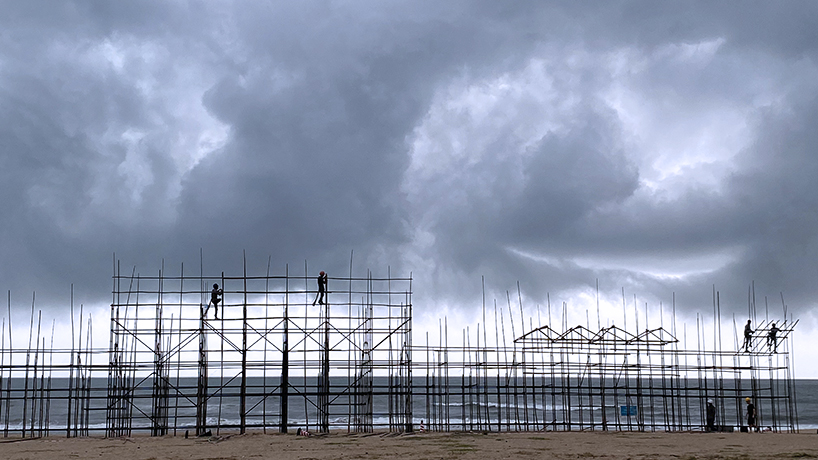 traditional bamboo scaffolding constructs temporary theater along chinese coast