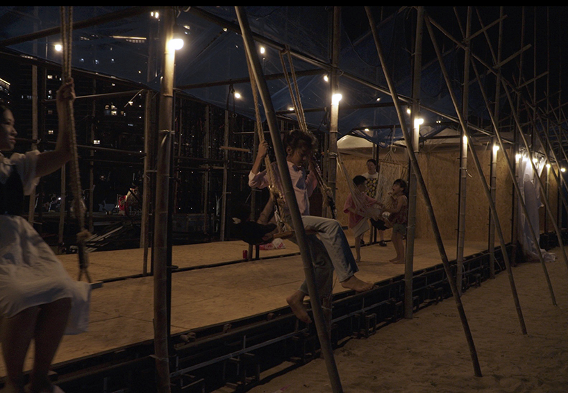 traditional bamboo scaffolding constructs temporary theater along chinese coast