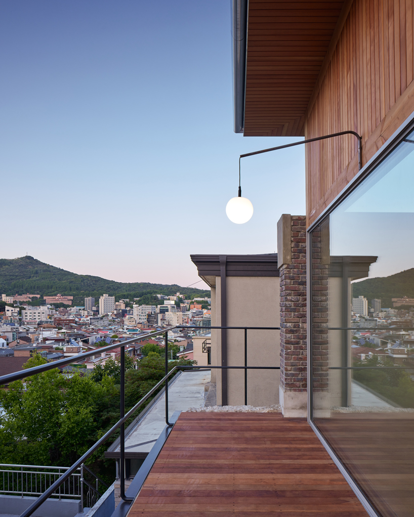 reclaimed brick skin and wooden frame update 1969 seoul residence