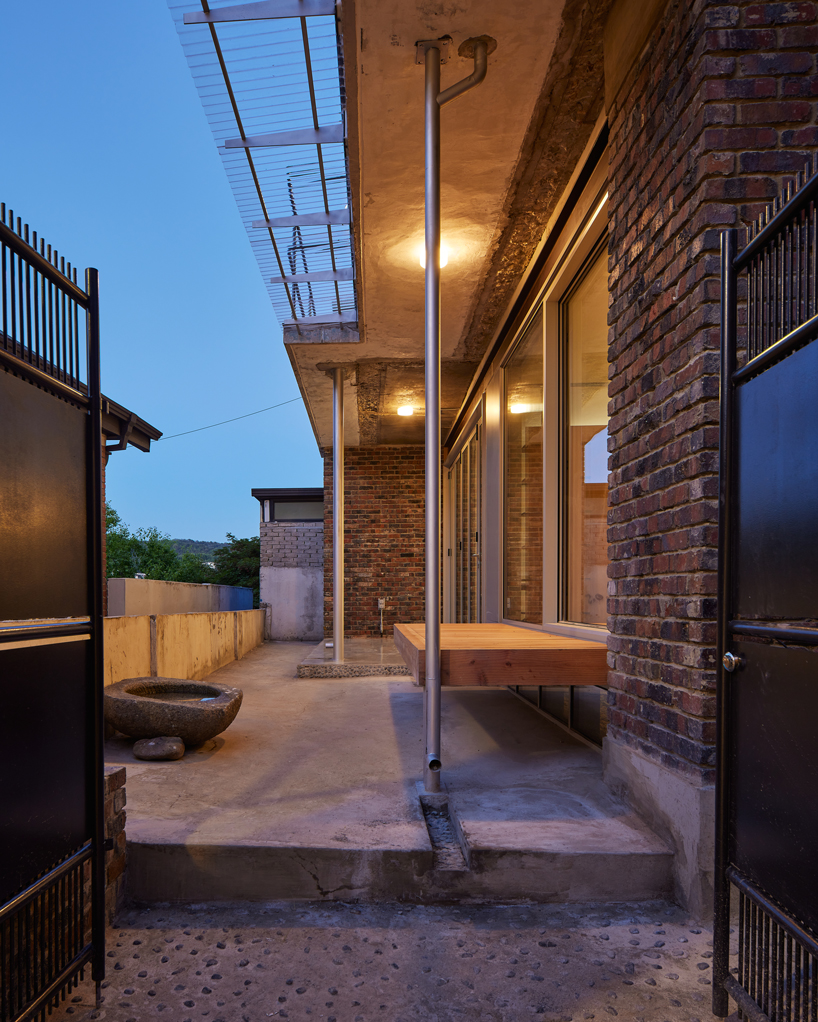 reclaimed brick skin and wooden frame update 1969 seoul residence