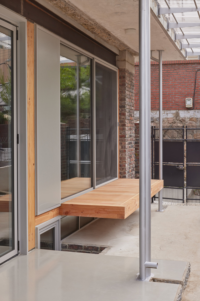 reclaimed brick skin and wooden frame update 1969 seoul residence