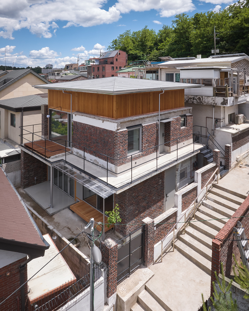 reclaimed brick skin and wooden frame update 1969 seoul residence