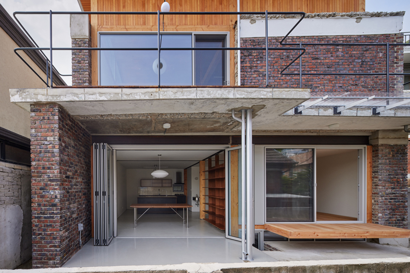 reclaimed brick skin and wooden frame update 1969 seoul residence