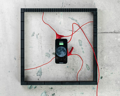 viewers activate this beating heart art installation by charging their smartphone