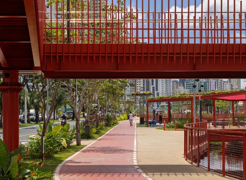 elevated linear park reclaims canal runing along brazilian city center