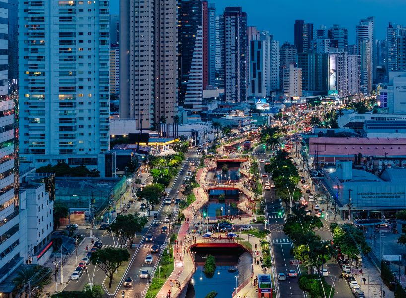 elevated linear park reclaims canal runing along brazilian city center