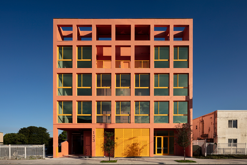 gridded peach residential facade rethinks affordable housing in miami