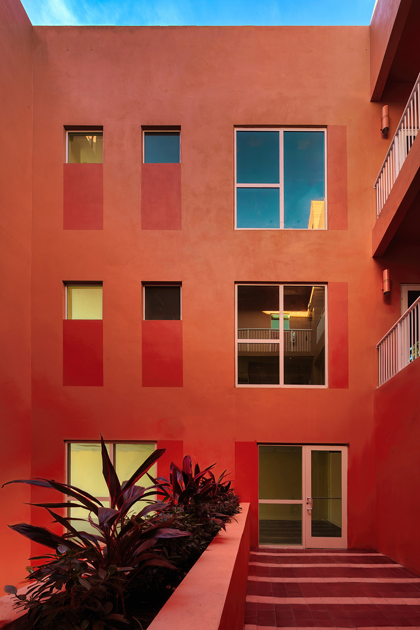 gridded peach residential facade rethinks affordable housing in miami