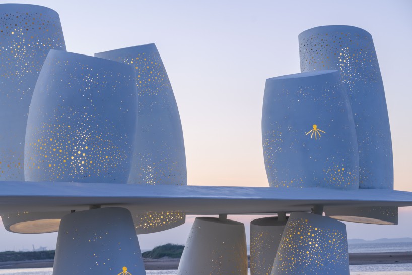 white stainless-steel cylinders form coral-like swing installation on chinese coast - 9