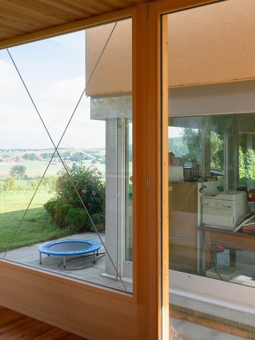 timber garden folly pavilion transitions between resting shelter and planted patio