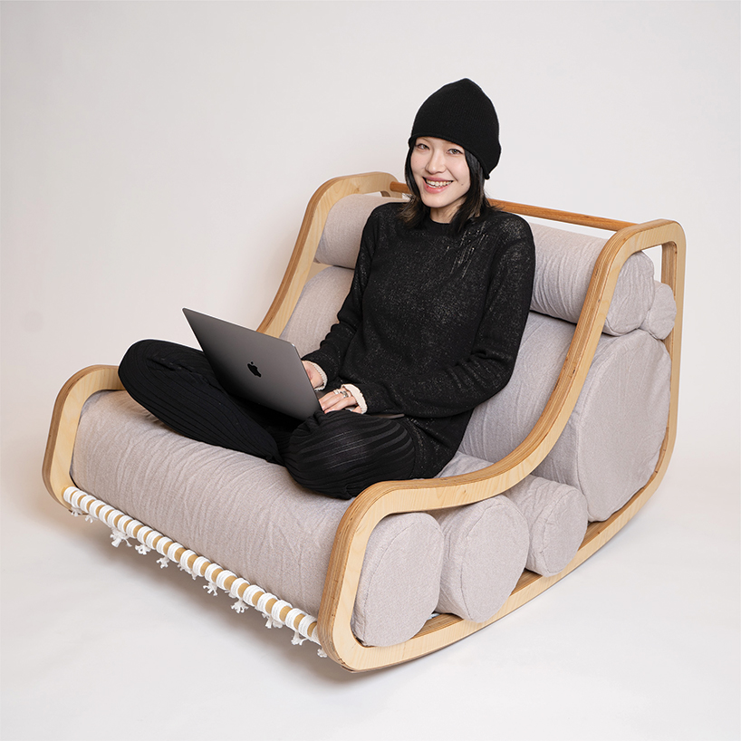 a series of movable cylindrical cushions reposition to form modular column chair - 3