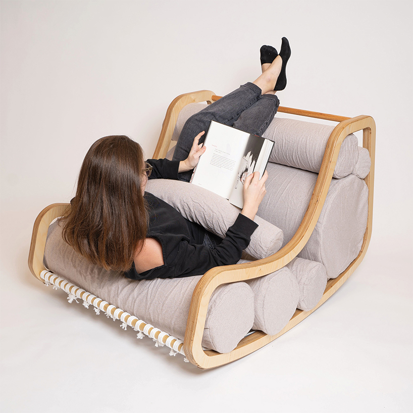 a series of movable cylindrical cushions reposition to form modular column chair - 4