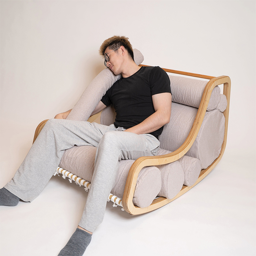 a series of movable cylindrical cushions reposition to form modular column chair - 5