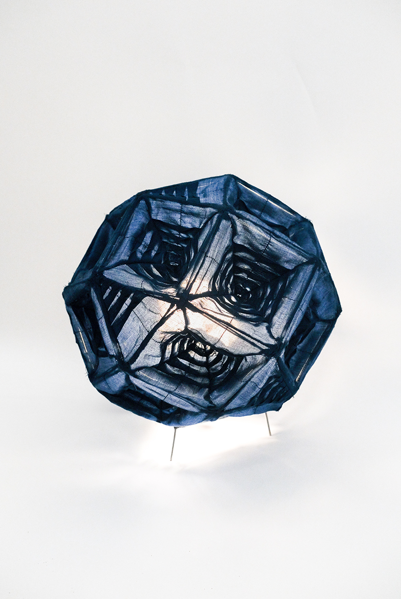 pleated fabric shapes aoi&rsquo;s structural lighting form - 1