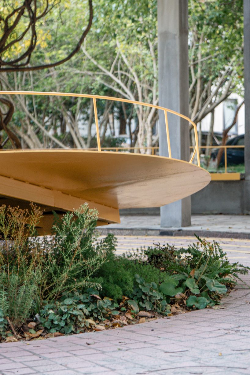 studio RE+N turns abandoned planter into floating yellow stage in shanghai neighborhood - 9