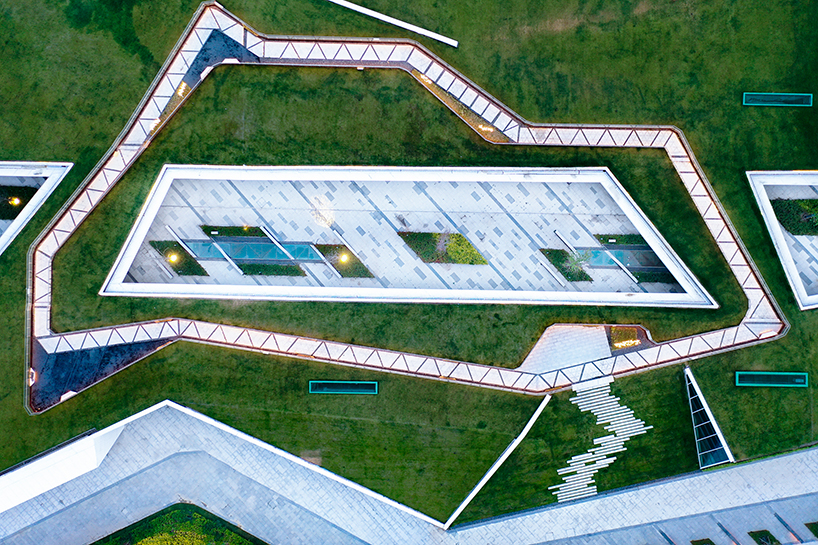 radiating paving and green roofs recast xuzhou rail station as urban gateway and public realm - 8