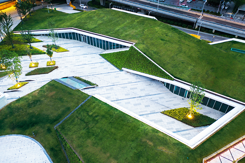radiating paving and green roofs recast xuzhou rail station as urban gateway and public realm - 6