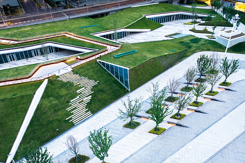 radiating paving and green roofs recast xuzhou rail station as urban gateway and public realm - 7