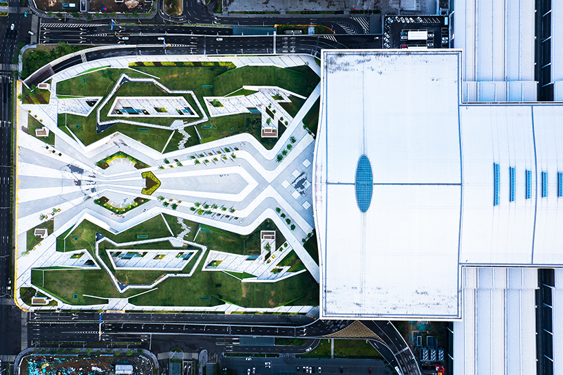 radiating paving and green roofs recast xuzhou rail station as urban gateway and public realm - 3