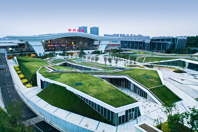 radiating paving and green roofs recast xuzhou rail station as urban gateway and public realm - 2