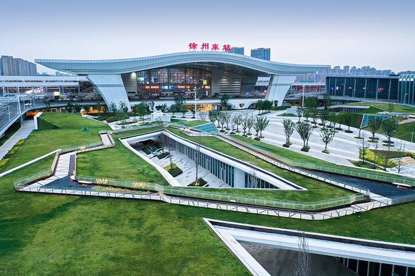 radiating paving and green roofs recast xuzhou rail station as urban gateway and public realm - 1