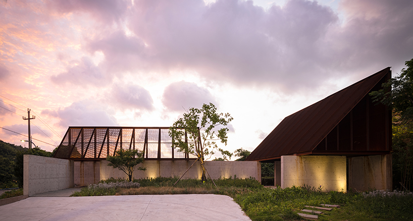 corten-clad twin pavilions frame shifting sea views along chinese coastal valley - 12