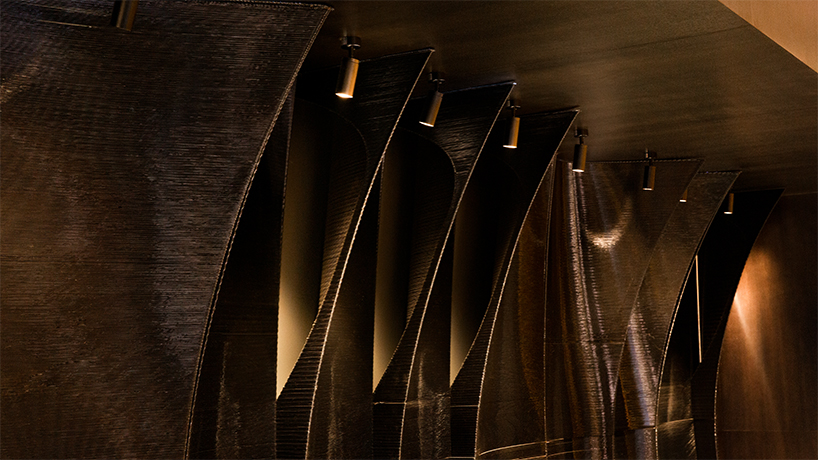 crescent lights and mirrored moons carve a slow-paced retreat inside xi’an bar - 8