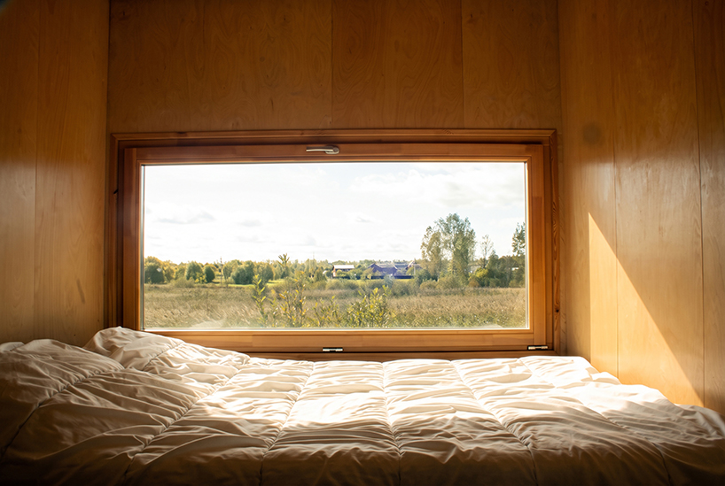 repurposed shipping container becomes 24-sqm birch plywood micro-cabin - 7