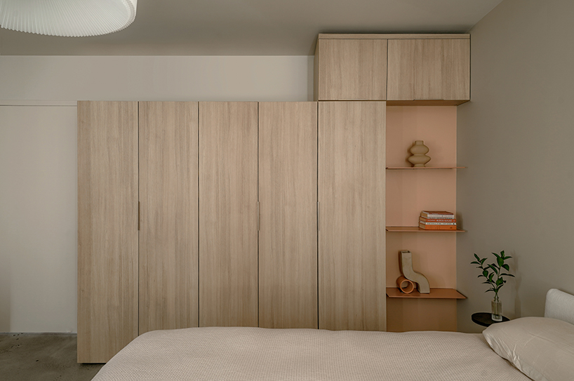interlocking millwork volumes reshape brooklyn apartment into layered interior - 7