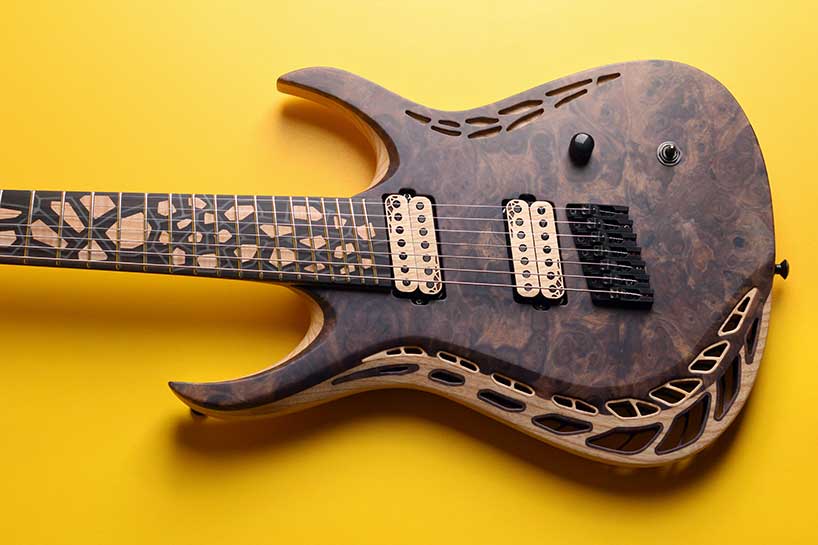 natural geometrics and organic variation inform omer deutsch's handcrafted guitars - 11