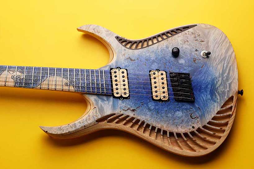 natural geometrics and organic variation inform omer deutsch's handcrafted guitars - 9