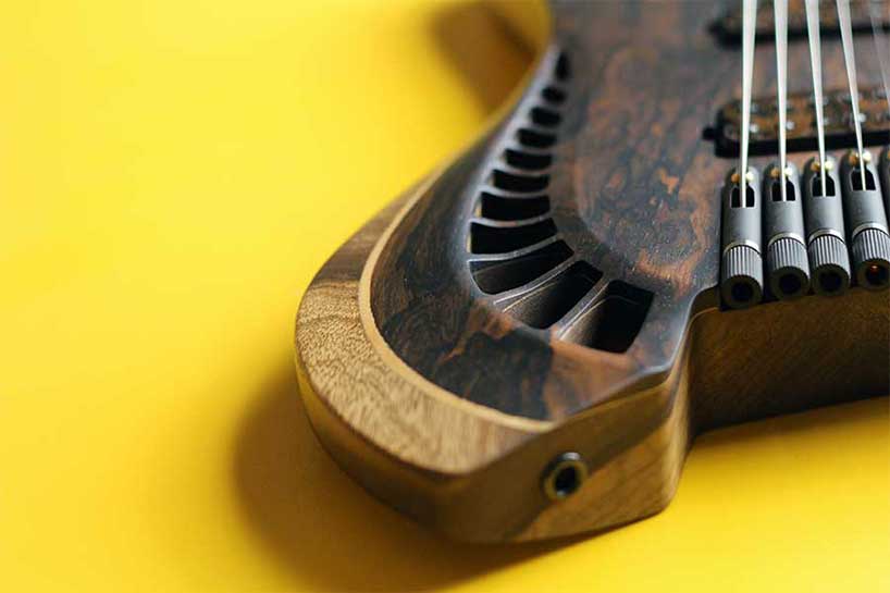 natural geometrics and organic variation inform omer deutsch's handcrafted guitars - 5