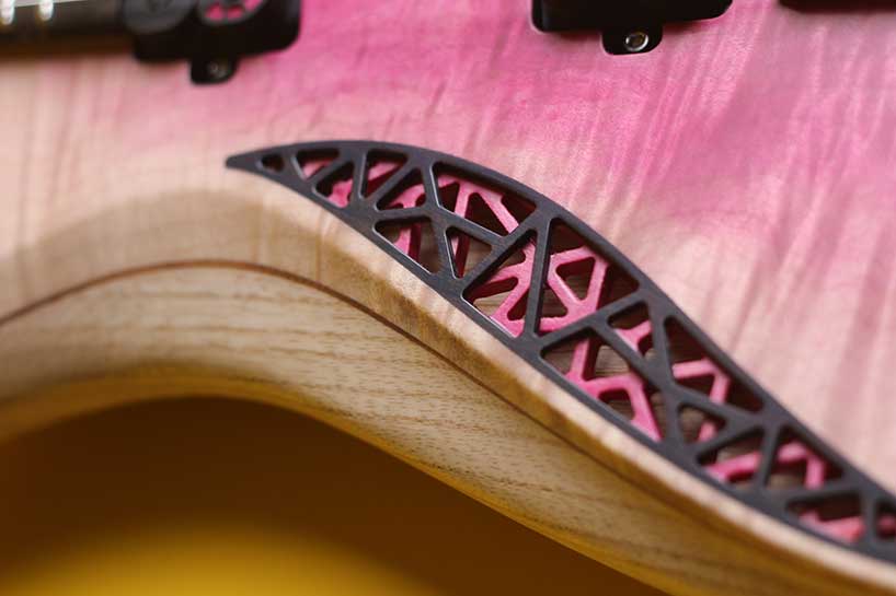 natural geometrics and organic variation inform omer deutsch's handcrafted guitars - 8