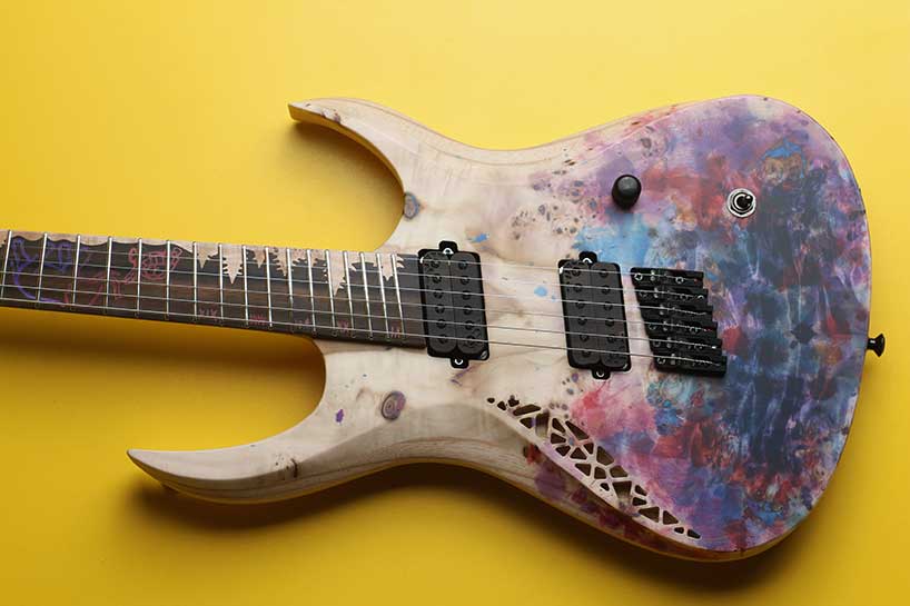 natural geometrics and organic variation inform omer deutsch's handcrafted guitars - 7