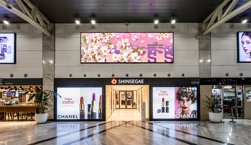 blooming graphics and floral installations take over shinsegae department store for spring - 7