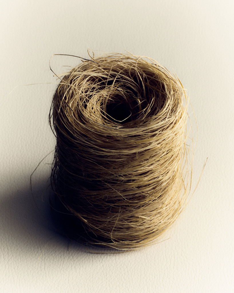 interlaced wood, metal, and fiber explore braiding as construction method in trenzar series - 11