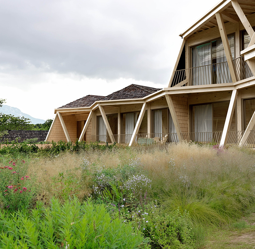fragmented timber volumes compose forested mountain housing by arup in albania - 12