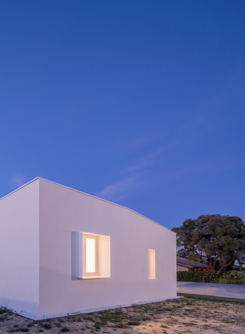 casa violetas balances enclosure and openness through courtyard living in madrid - 9