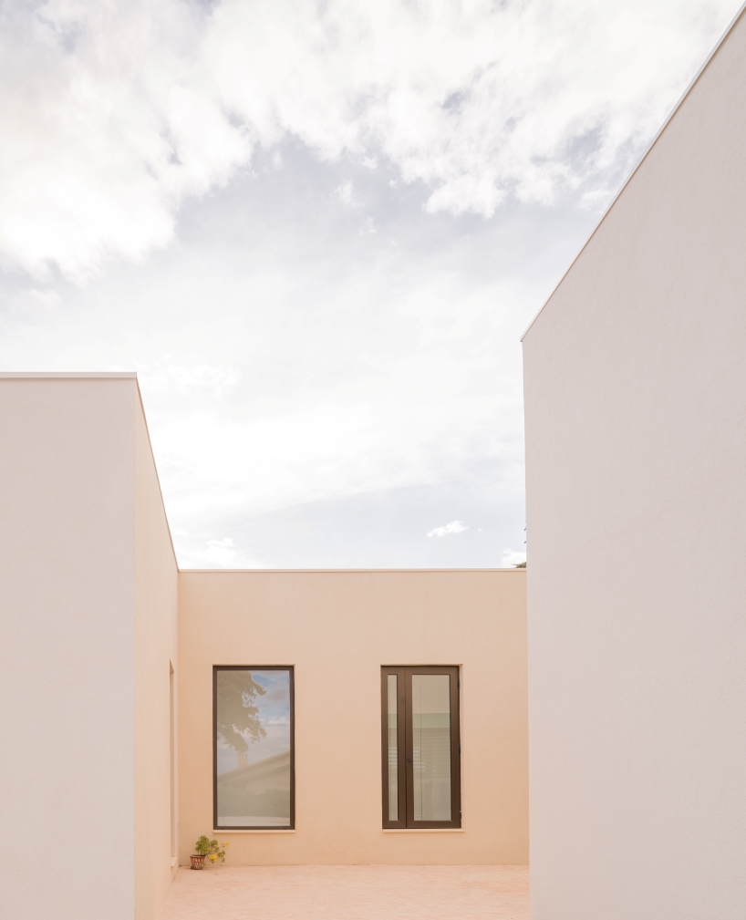 casa violetas balances enclosure and openness through courtyard living in madrid - 3