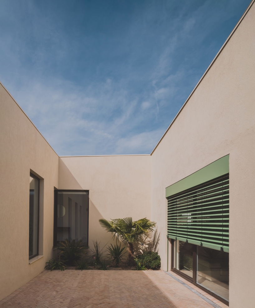 casa violetas balances enclosure and openness through courtyard living in madrid - 4