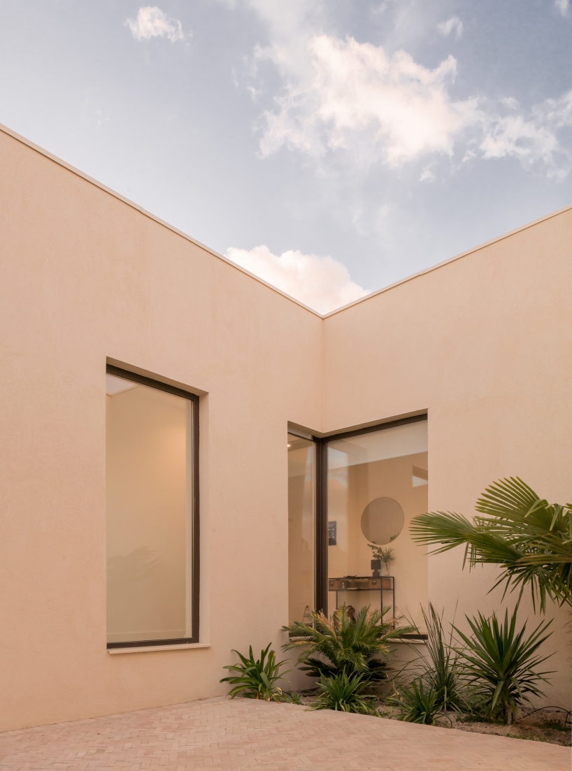 casa violetas balances enclosure and openness through courtyard living in madrid - 5