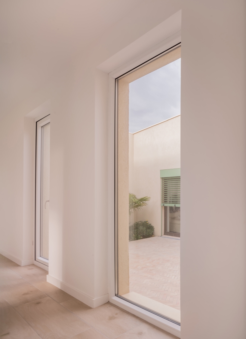 casa violetas balances enclosure and openness through courtyard living in madrid - 7
